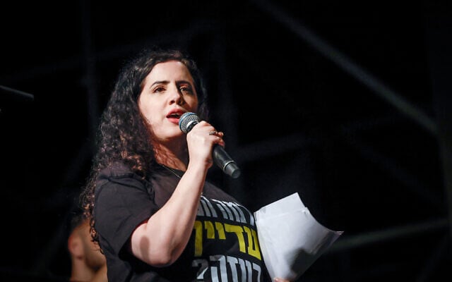 MK Naama Lazimi speaks at an anti-government protest near the Knesset in Jerusalem, March 31, 2025. (Yonatan Sindel/ Flash90) MK Naama Lazimi speaks at an anti-government protest near the Knesset in Jerusalem, March 31, 2025. (Yonatan Sindel/ Flash90)