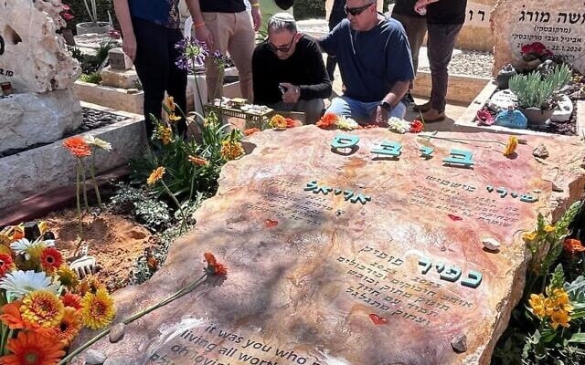 A month after Shiri, Ariel and Kfir Bibas were laid to rest in Israel, the gravestone for the three slain hostages was unveiled at a family ceremony on March 27, 2025, at the Tsohar cemetery near Kibbutz Nir Oz. They were abducted from their kibbutz on October 7, 2023 by Hamas-led terrorists, and later brutally murdered in Gaza by their captors. (Israel Katorza, via Assaf Pozailov, Kann / X) A month after Shiri, Ariel and Kfir Bibas were laid to rest in Israel, the gravestone for the three slain hostages was unveiled at a family ceremony on March 27, 2025, at the Tsohar cemetery near Kibbutz Nir Oz. They were abducted from their kibbutz on October 7, 2023 by Hamas-led terrorists, and later brutally murdered in Gaza by their captors. (Israel Katorza, via Assaf Pozailov, Kann / X)