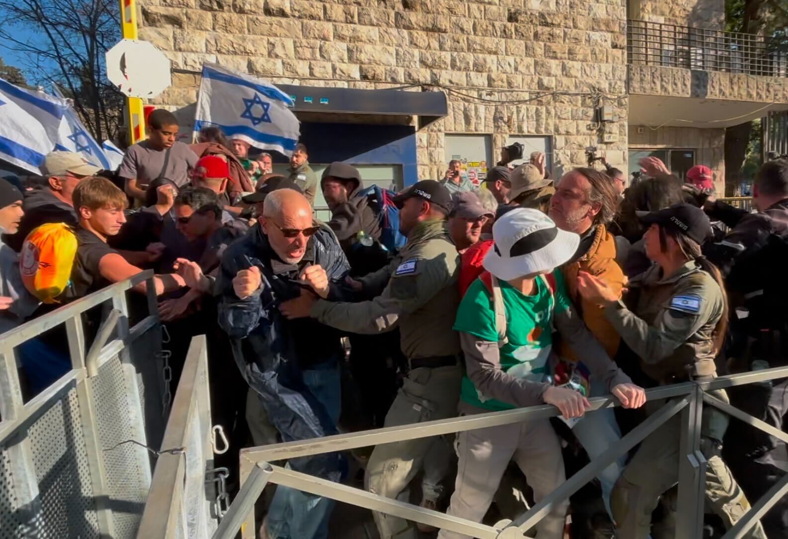 Protesters clash with police in Jerusalem as thousands march against government