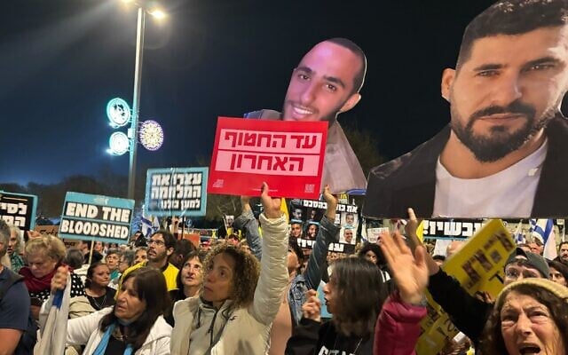 Protesters rally for a hostage deal outside the Prime Minister's Office in Jerusalem on March 25, 2025. (Charlie Summers/Times of Israel)