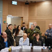 Democrats MK Gilad Kariv is ejected from the Knesset Constitution, Law and Justice Committee following a vote on a highly controversial law changing Israel's judicial appointments process, March 19, 2025. (Noam Moskowitz, Office of the Knesset Spokesperson)