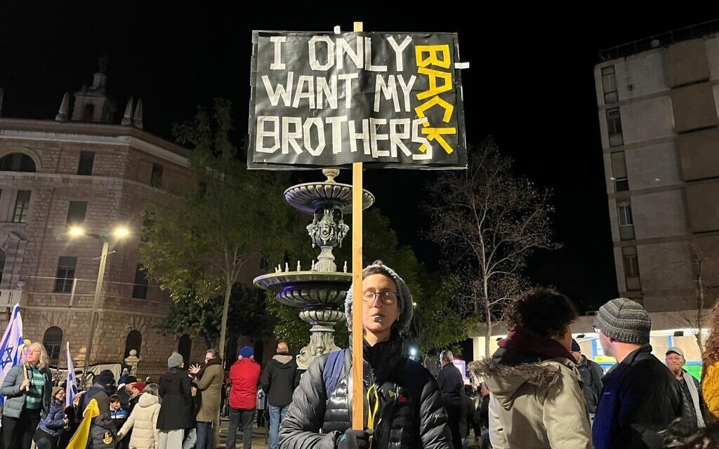 A protestor standing in Jerusalem’s Paris Square on March 22, 2025. (Ofra Kupferman/Israeli Pro-Democracy Protest Movement)