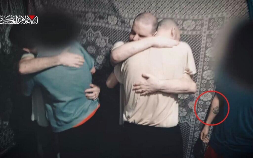 Hostage Nimrod Cohen's forearm (R) is seen in a video posted by Hamas on March 1, 2025. (Screen capture/X)
