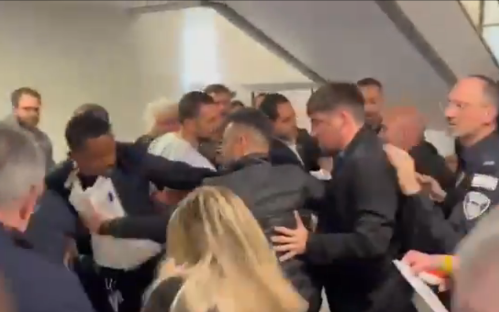 Violence at the Knesset as hostages' families are forcibly barred by Knesset guards from entering the plenum visitors’ gallery, March 3, 2025 (Video screenshot)