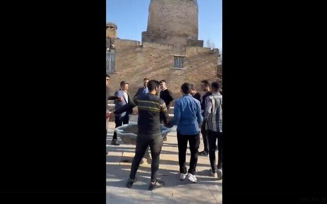 Iranian Jews dance at the Tomb of Mordechai and Esther in Hamadan, Iran, March 13, 2025. (X video screenshot: used in accordance with Clause 27a of the Copyright Law) Iranian Jews dance at the Tomb of Mordechai and Esther in Hamadan, Iran, March 13, 2025. (X video screenshot: used in accordance with Clause 27a of the Copyright Law)