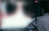 A retired Iranian air force colonel, referred to pseudonymously as Arash, speaks to Israel's Channel 12 in an interview broadcast March 15, 2025. (Screen capture: Channel 12)