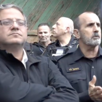 National Security Minister Itamar Ben Gvir (left) stands next Police Commissioner Daniel Levy in a clip produced by the police for the Otzma Yehudit party, posted on March 22, 2025. (X screenshot used in accordance with article 27a of the Copyright Law)