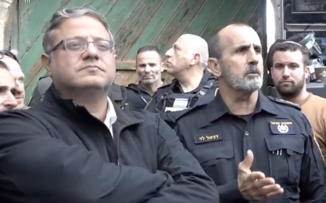 National Security Minister Itamar Ben Gvir (left) stands next Police Commissioner Daniel Levy in a clip produced by the police for the Otzma Yehudit party, posted on March 22, 2025. (X screenshot used in accordance with article 27a of the Copyright Law) National Security Minister Itamar Ben Gvir (left) stands next Police Commissioner Daniel Levy in a clip produced by the police for the Otzma Yehudit party, posted on March 22, 2025. (X screenshot used in accordance with article 27a of the Copyright Law)