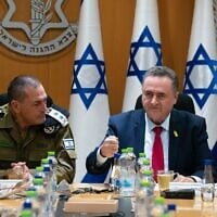 Defense Minister Israel Katz (right) and new IDF Chief of Staff Lt. Gen. Eyal Zamir (left) meet with the IDF General Staff Forum, March 5, 2025. (Ariel Hermoni/ Defense Ministry)