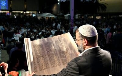 Reading the Book of Esther on Purim night, March 13, 2025 in Tel Aviv's Hostages Square (Paulina Patimer / Hostages Families Forum)