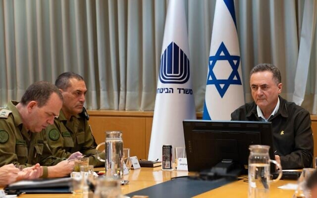 Defense Minister Israel Katz meets with IDF Chief of Staff Lt. Gen. Eyal Zamir, Operations Directorate chief Maj. Gen. Oded Basiuk, and other top officials during an assessment, March 20, 2025. (Ariel Hermoni/Defense Ministry) Defense Minister Israel Katz meets with IDF Chief of Staff Lt. Gen. Eyal Zamir, Operations Directorate chief Maj. Gen. Oded Basiuk, and other top officials during an assessment, March 20, 2025. (Ariel Hermoni/Defense Ministry)