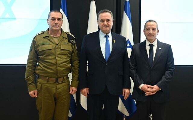 IDF Chief of Staff Lt. Gen. Eyal Zamir, Defense Minister Israel Katz, and new Defense Ministry Director General Amir Baram are seen at a ceremony at the ministry, March 24, 2025. (Defense Ministry) IDF Chief of Staff Lt. Gen. Eyal Zamir, Defense Minister Israel Katz, and new Defense Ministry Director General Amir Baram are seen at a ceremony at the ministry, March 24, 2025. (Defense Ministry)
