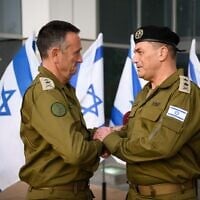 Incoming IDF Chief of Staff Lt. Gen. Eyal Zamir (right) and outgoing chief Lt. Gen. Herzi Halevi (left) at a handover ceremony at the military's Kirya headquarters in Tel Aviv, March 5, 2025. (Israel Defense Forces)