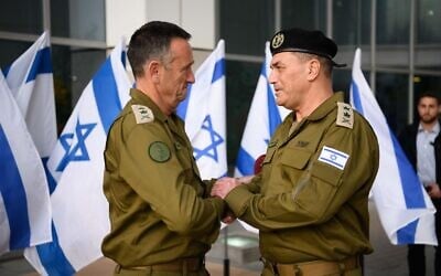 Incoming IDF Chief of Staff Lt. Gen. Eyal Zamir (right) and outgoing chief Lt. Gen. Herzi Halevi (left) at a handover ceremony at the military's Kirya headquarters in Tel Aviv, March 5, 2025. (Israel Defense Forces)