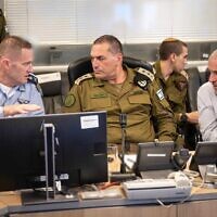 IDF Chief of Staff Lt. Gen. Eyal Zamir, center, Shin Bet head Ronen Bar, right, and chief of the Israeli Air Force Maj. Gen. Tomer Bar at the IAF's underground command center at the military headquarters in Tel Aviv, March 18, 2025. (IDF)