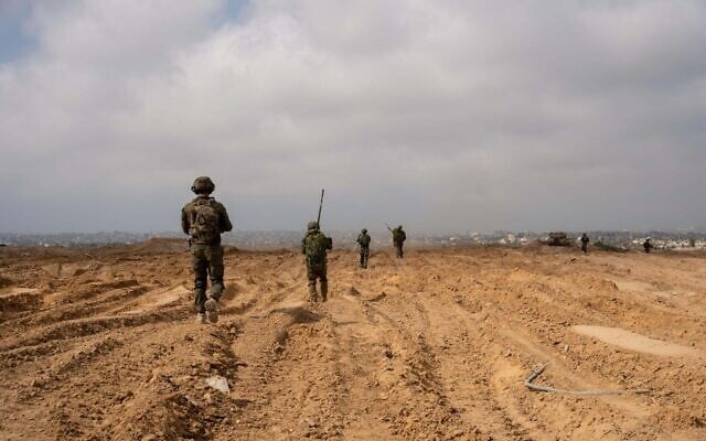 Troops of the Gaza Division operate in the southern Gaza Strip, in a handout photo issued by the military on March 19, 2025. (Israel Defense Forces) Troops of the Gaza Division operate in the southern Gaza Strip, in a handout photo issued by the military on March 19, 2025. (Israel Defense Forces)