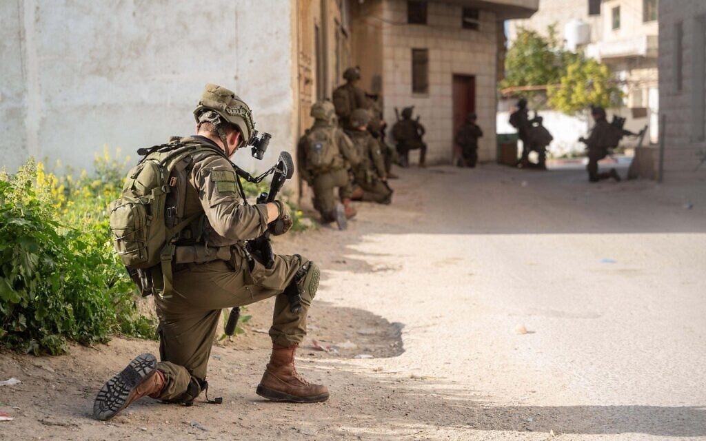 IDF troops operate in the West Bank, in a handout photo published March 14, 2025. (Israel Defense Forces)
