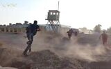 Hamas terrorists attack the IDF's Nahal Oz base on October 7, 2023, as seen in footage released by the terror group. (Screenshot: Telegram)