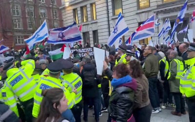 Members of London's Jewish community protest outside the launch of the book “Understanding Hamas: And Why That Matters" at the London School of Economics, March 10, 2025. (X video screenshot: used in accordance with Clause 27a of the Copyright Law)