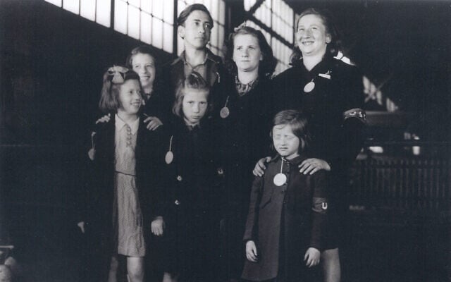 The seven Weber siblings upon their arrival at New York Harbor in May 1946. Bottom row from left: Renee, Judith, and Bela. Top row from left: Gertrude, Alfons, Senta, and Ruth. (Courtesy of United States Holocaust Memorial Museum)