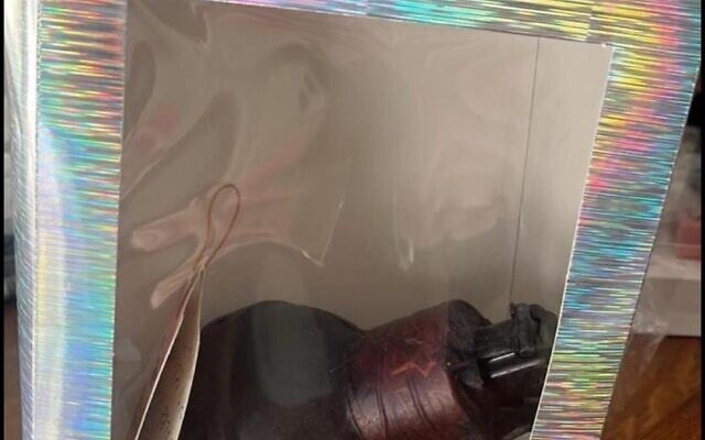 A gift-wrapped hand grenade that was placed at the doorstep of Merom HaGalil Regional Council chairman Amit Sofer on March 4, 2025. (Israel Police) A gift-wrapped hand grenade that was placed at the doorstep of Merom HaGalil Regional Council chairman Amit Sofer on March 4, 2025. (Israel Police)