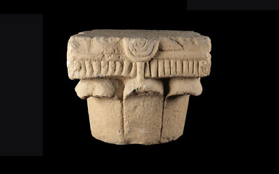 A capital decorated with menorahs dating to the 2nd-4th centuries CE has been uncovered in the Motza neighborhood in Jerusalem, the Israel Antiquities Authority announced on April 29, 2025. (Arkady Ostrovsky/Israel Antiquities Authority)