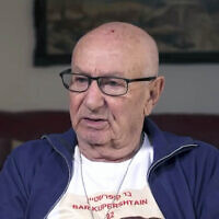 Michael Kupershtein, a Holocaust survivor and the grandfather of hostage Bar Kupershtein, in a TV interview in February 2024. (Kan news/screenshot)