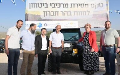 Settlements and National Missions Minister Orit Strock (second from right) and Finance Minister Bezalel Smotrich (third from left) attend a ceremony at the illegal settlement farming outpost of Meitarim Farm, handing over ATVs to illegal settlements and farming outpost, April 3, 2025. (Freddy Barmi)