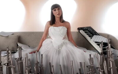 Palestinian singer Lina Makoul is seen in the music video of her song Fish Masari (there is no money), published August 31, 2023. (Screen capture: Youtube)