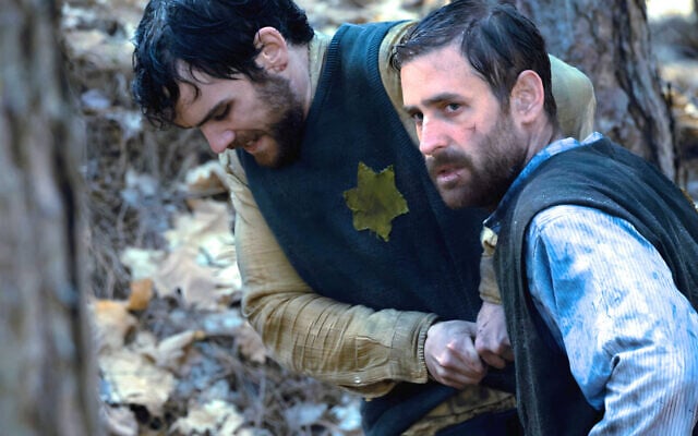 Oliver Jackson-Cohen as Solomon Wiener, left, and Jeremy Neumark Jones as Michael Podchlebnik in 'The World Will Tremble' by Israeli director Lior Geller. (Courtesy)