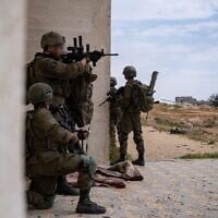 IDF troops operate in the Gaza Strip, in a handout photo issued by the military on April 17, 2025. (Israel Defense Forces)