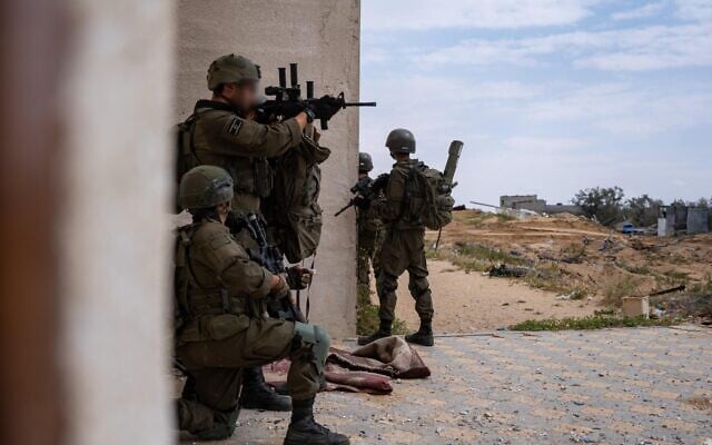 IDF troops operate in the Gaza Strip, in a handout photo issued by the military on April 17, 2025. (Israel Defense Forces)
