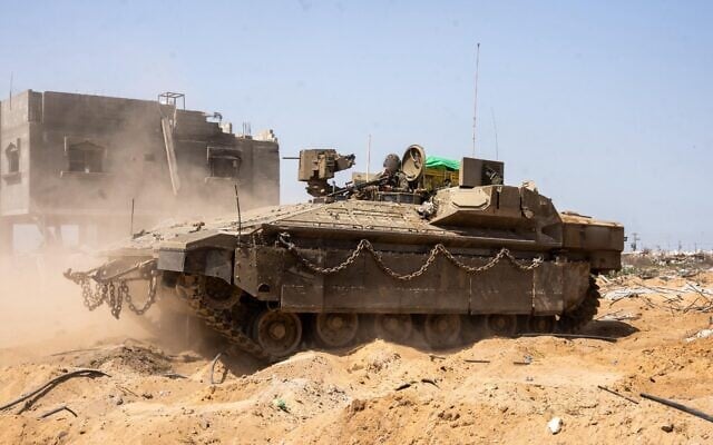 Troops of the 188th Armored Brigade operate in southern Gaza's Rafah in a handout photo issued on April 13, 2025. (Israel Defense Forces) Troops of the 188th Armored Brigade operate in southern Gaza's Rafah in a handout photo issued on April 13, 2025. (Israel Defense Forces)