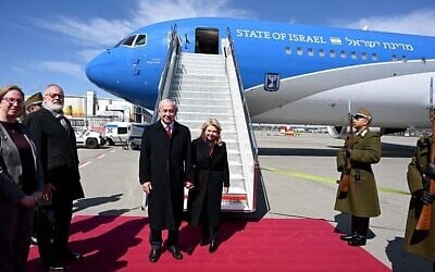 Prime Minister Benjamin Netanyahu (left) and his wife Sara prepare to board a plane in Budapest on their way to Washington DC on April 6, 2025 (Avi Ohayon/GPO)