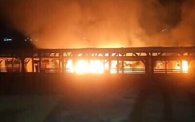 A fire burns at a wedding hall allegedly lit by settlers, in the West Bank village of Bidya, April 8, 2025. (X; used in accordance with Clause 27a of the Copyright Law)