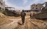 IDF troops of the 401st Armored Brigade operate in the northern Gaza Strip in a handout photo issued on April 4, 2025. (Israel Defense Forces)