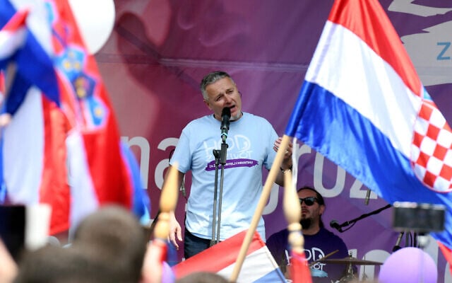 Croatian singer Marko Perkovic Thompson performs during the 'March for Life,' Croatia's fourth annual anti-abortion march, on May 25, 2019 in Zagreb. (AFP) Croatian singer Marko Perkovic Thompson performs during the 'March for Life,' Croatia's fourth annual anti-abortion march, on May 25, 2019 in Zagreb. (AFP)