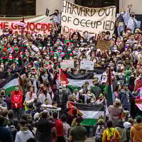 Pro-Palestinian, anti-Israel protesters gather at Harvard University to show their support for Palestinians in Gaza at a rally in Cambridge, Massachusetts, on October 14, 2023, a week after Hamas terrorists launched a massacre in southern Israel. (Joseph Prezioso / AFP)