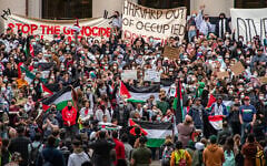 Pro-Palestinian, anti-Israel protesters gather at Harvard University to show their support for Palestinians in Gaza at a rally in Cambridge, Massachusetts, on October 14, 2023. (Joseph Prezioso / AFP)