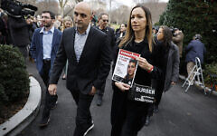 Yael (R) and Adi Alexander, parents of American-Israeli hostage Edan Alexander who is held in Gaza by Palestinian terrorists, walk back into the West Wing of the White House after talking to reporters on December 13, 2023, in Washington, DC. (Chip Somodevilla/Getty Images/AFP)