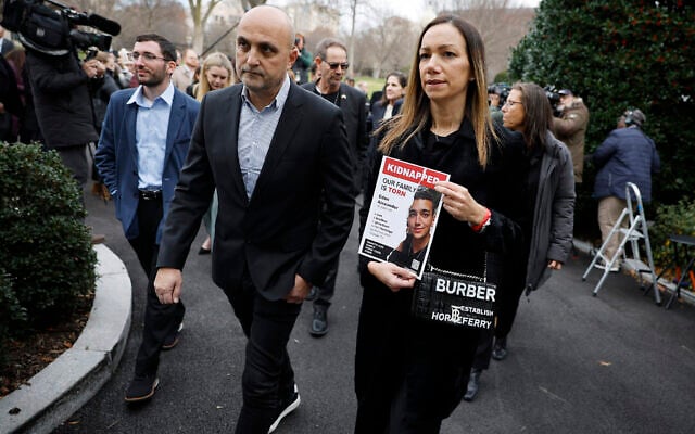 Yael (R) and Adi Alexander, parents of American-Israeli hostage Edan Alexander, who is held in Gaza by Palestinian terrorists, walk back into the West Wing of the White House after talking to reporters on December 13, 2023, in Washington, DC. (Chip Somodevilla/Getty Images/AFP)