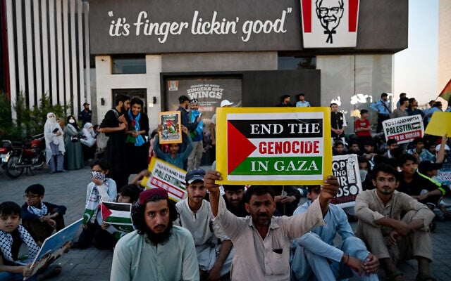 Supporters of Islami Jamiat-e-Talaba (IJT), a student wing of Pakistan's Jamaat-e-Islami (JI) party stage a pro-Palestinian and anti-Israel protest outside a Kentucky Fried Chicken (KFC) restaurant calling for boycott of Israeli products on the outskirts of Islamabad on May 7, 2024. (Farooq Naeem/AFP)