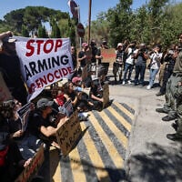 Border Police officers stand guard during an anti-war sit in organized by Israeli left-wing activists, in front of the British Consulate General in Jerusalem on August 16, 2024. (Ahmad Gharabli/AFP)