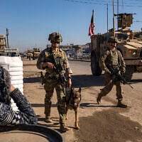 US soldiers patrol in Syria's northeastern city Qamishli, in the Hasakeh province, mostly controlled by Kurdish-led Syrian Democratic Forces (SDF), on January 9, 2025. (Delil Souleiman/AFP)