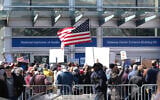 Demonstrators protest funding cuts outside of the National Institutes of Health (NIH) in Bethesda, Maryland, on March 8, 2025. (Michael Mathes / AFP)