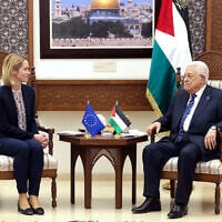 This handout picture provided by the Palestinian Authority's press office (PPO) shows Palestinian Authority President Mahmud Abbas (R) meeting with EU foreign policy chief Kaja Kallas in Ramallah on March 24, 2025. (Thaer Ghanaim / PPO / AFP) /