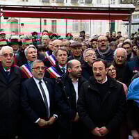Demonstrators sing the French national anthem as they take part in a gathering in support of Arié Engelberg, the rabbi of Orléans, on March 25, 2025, after he was attacked. (JEAN-FRANCOIS MONIER / AFP)