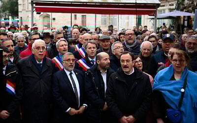 Demonstrators sing the French national anthem as they take part in a gathering in support of Arié Engelberg, the rabbi of Orléans, on March 25, 2025, after he was attacked. (JEAN-FRANCOIS MONIER / AFP)