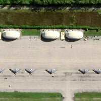 This satellite image released and taken on April 2, 2025 by Planet Labs PBC shows six American B-2 bomber planes on the tarmac of Mauritius' US military base on Diego Garcia island. ( Handout / Planet Labs / AFP)