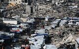 This aerial view shows Palestinians gathered at a makeshift market set up in the midst of a war devastated neighborhood in the Jabalia refugee camp in the northern Gaza Strip on April 2, 2025. (Bashar Taleb / AFP)